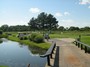 Men Teeing on Hole #3